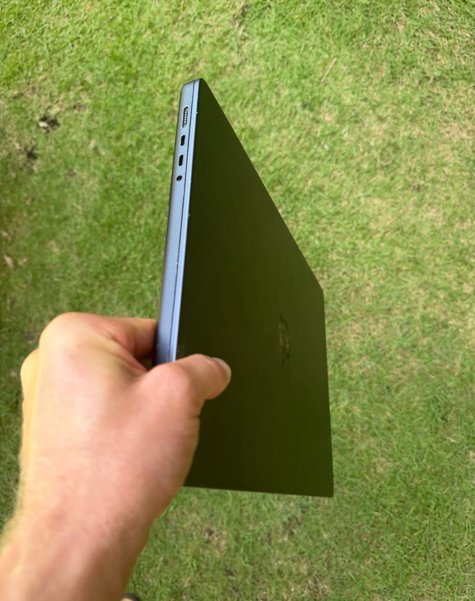 A laptop held shut, and the same laptop held tented half-open